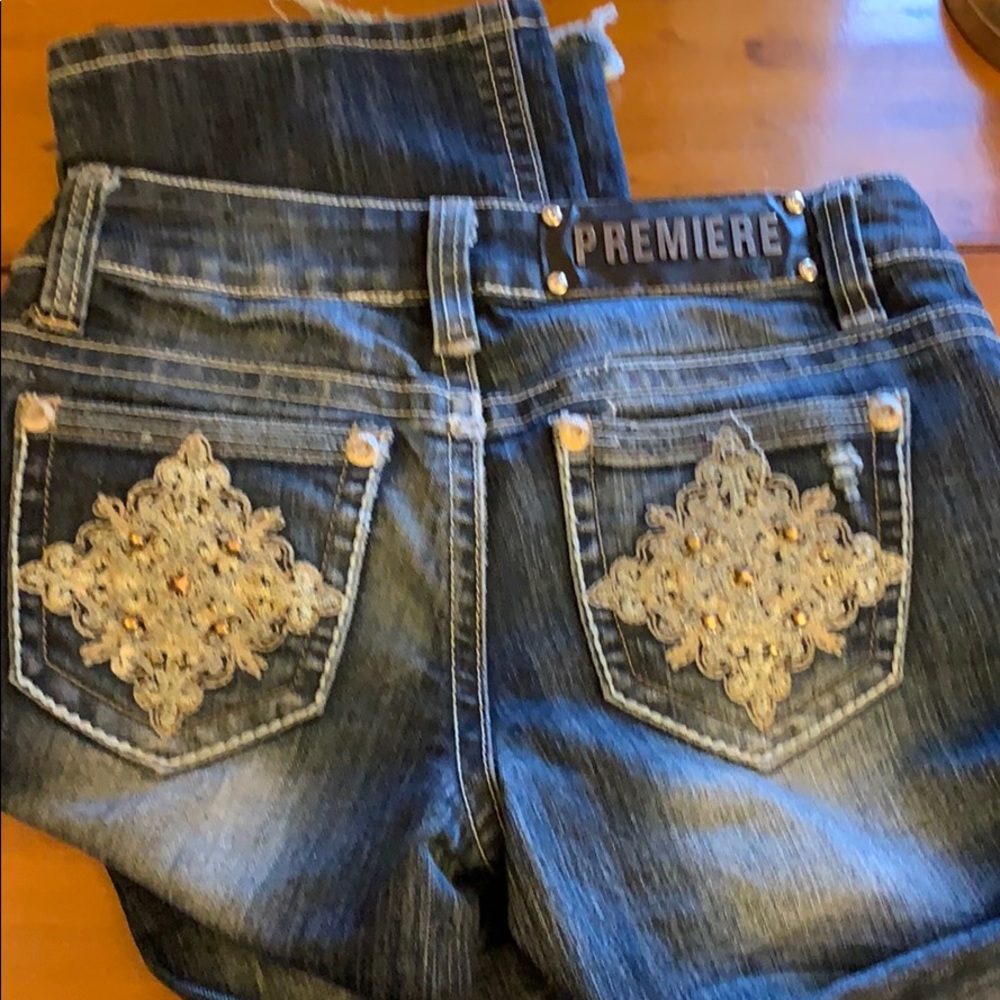 Embellished lace pockets Low rise teen jeans